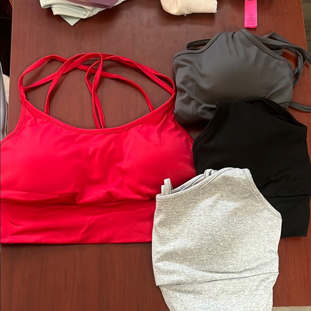 Red, Black, Gray, and Light Gray Sports Bras